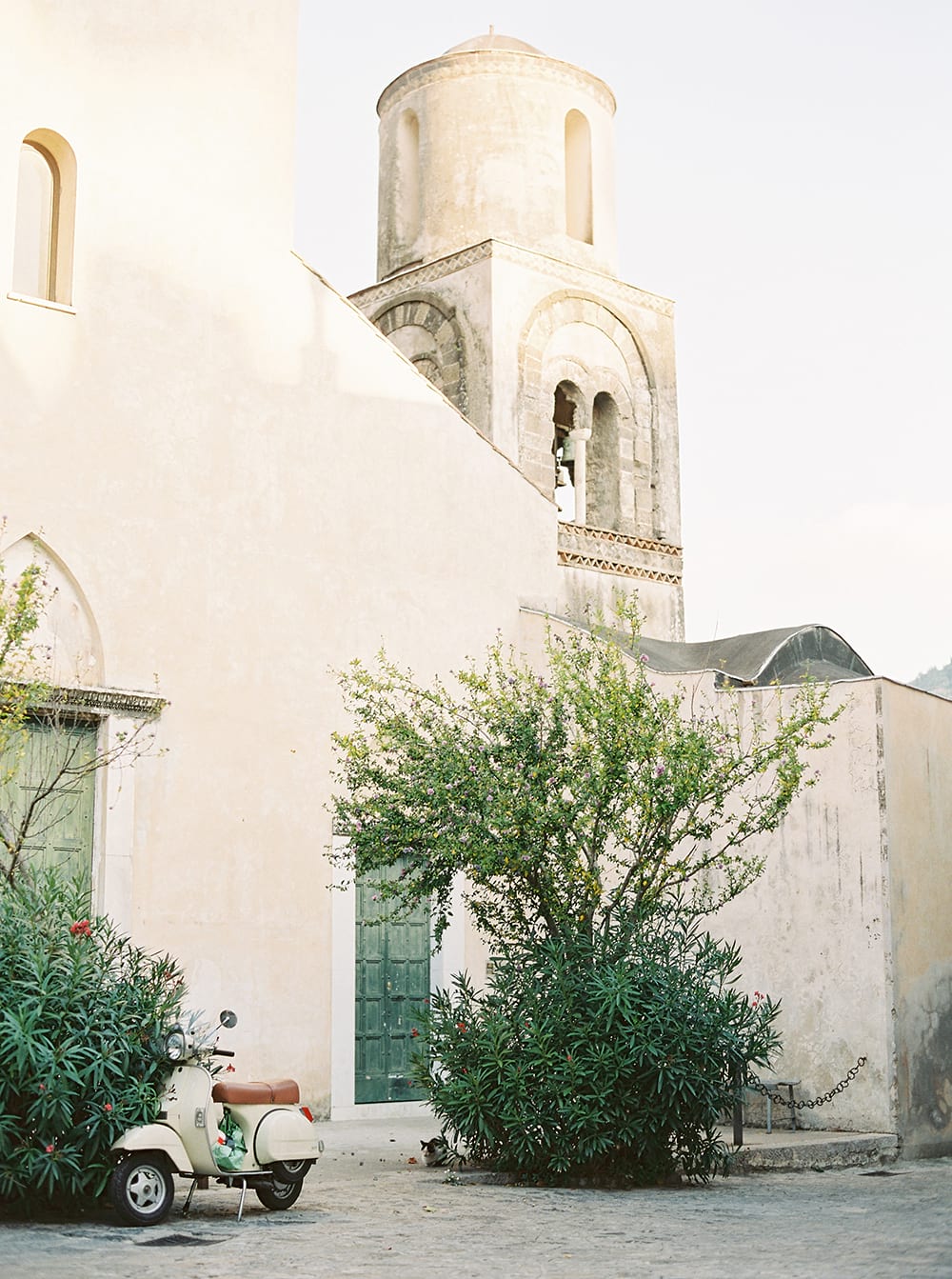 wedding villa cimbrone ravello, italy vespa in front of church 