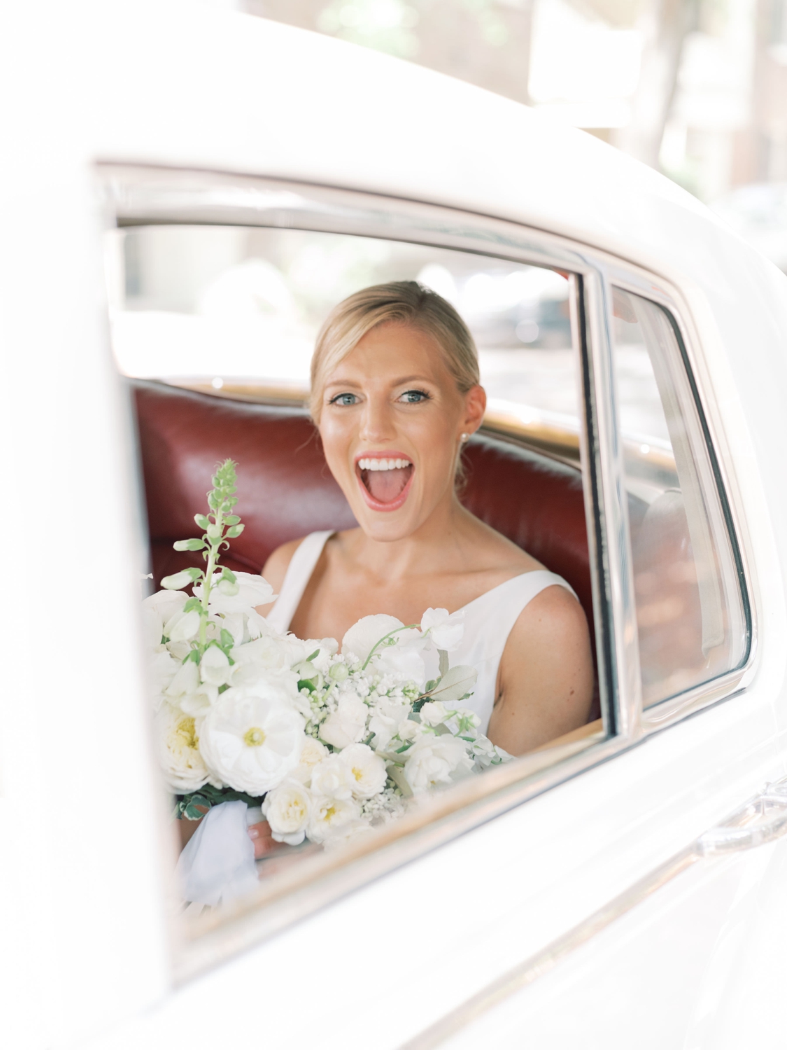 wedding at middleton place - bride in white getaway car